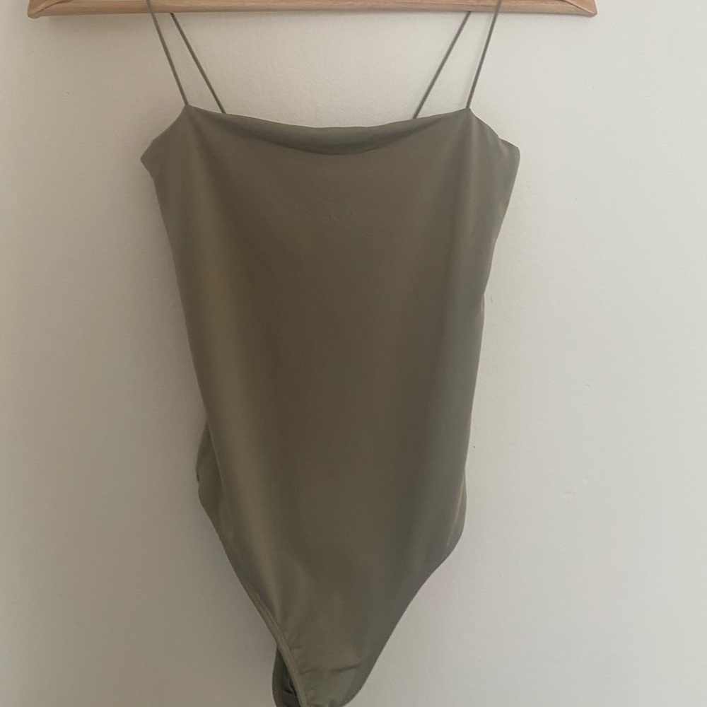 small jade green body suit
